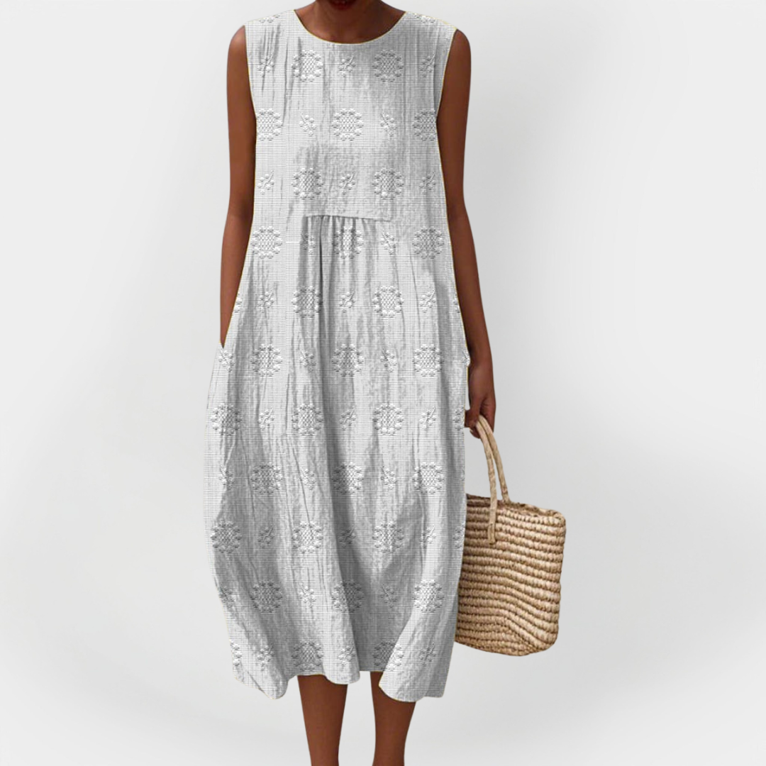 Elegantní bezrukávové šaty z bavlny s kapsami