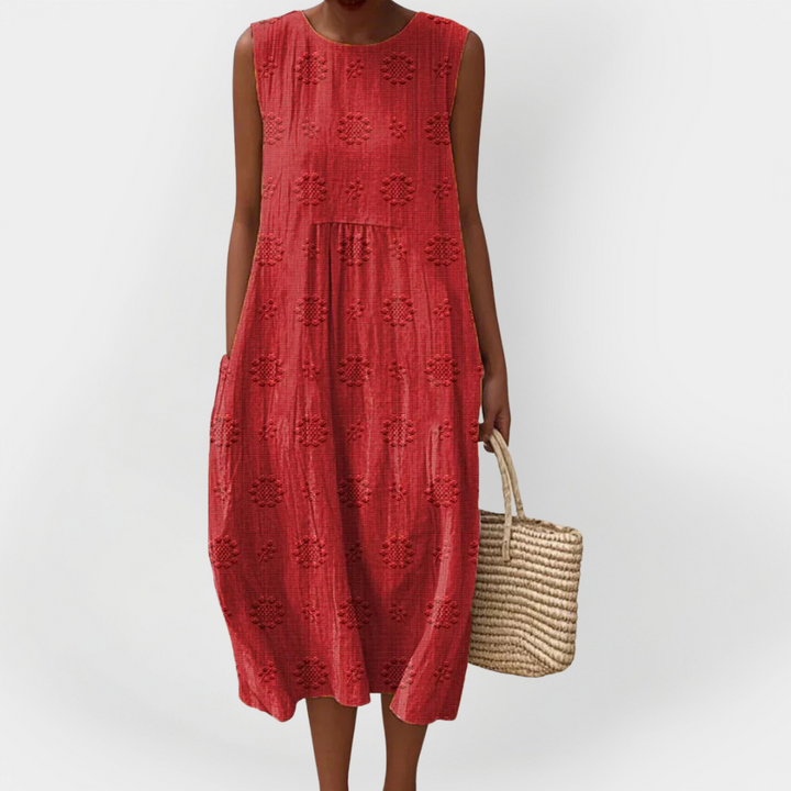 Elegantní bezrukávové šaty z bavlny s kapsami